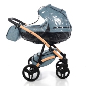 Vista laterale con navicella installata e parapioggia - Passeggino Trio Junama Vegan