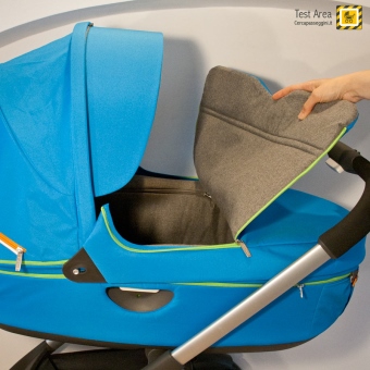 Stokke Crusi Duo - Apertura della copertina da entrambi i lati, tramite le due zip